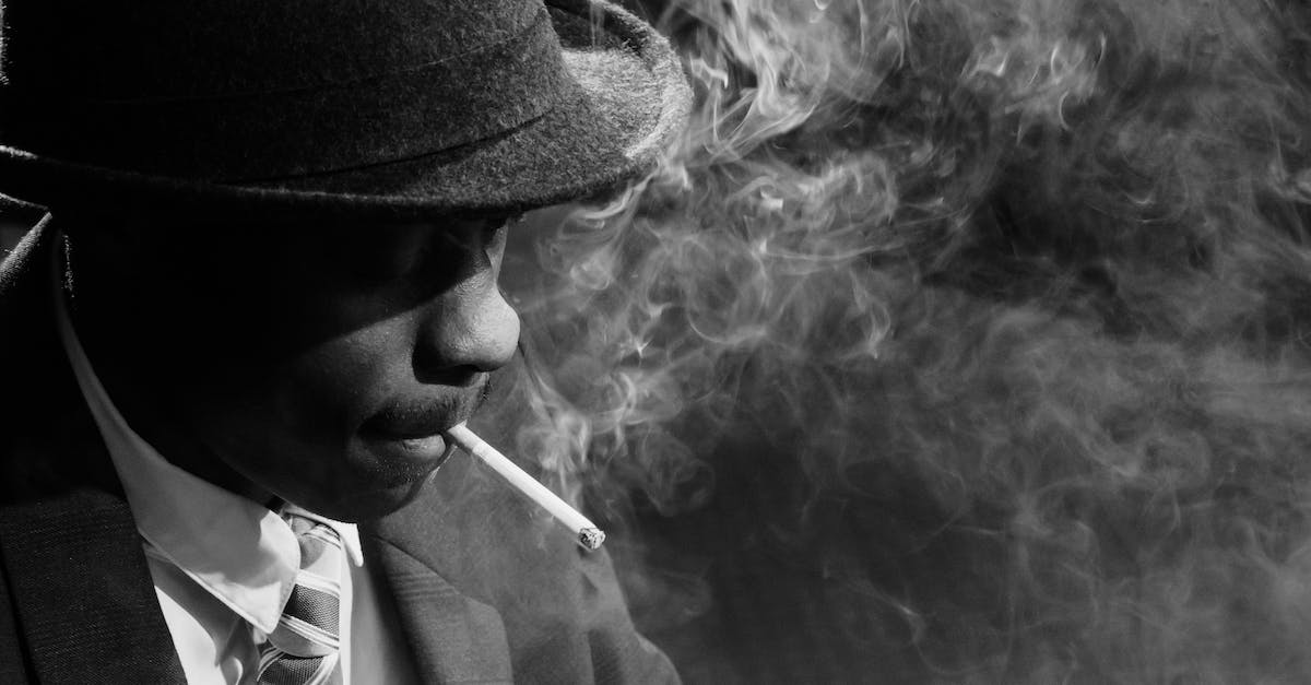 What does ranking up Investigator improve? - Close-Up Photo of Man Smoking Cigarette