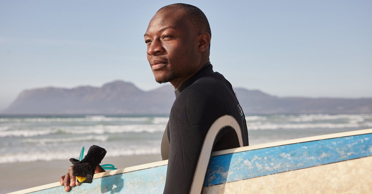 What does the 'Confidence' stat mean in Endless Legend? - Black man with surfboard on beach