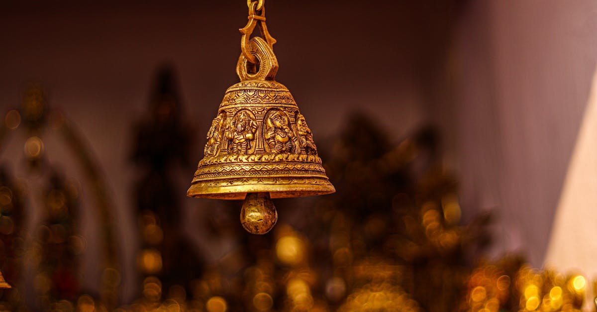 What does the Bell do? - Gold Bell With Yellow String Lights What does the Bell do? - Gold Bell With Yellow String Lights