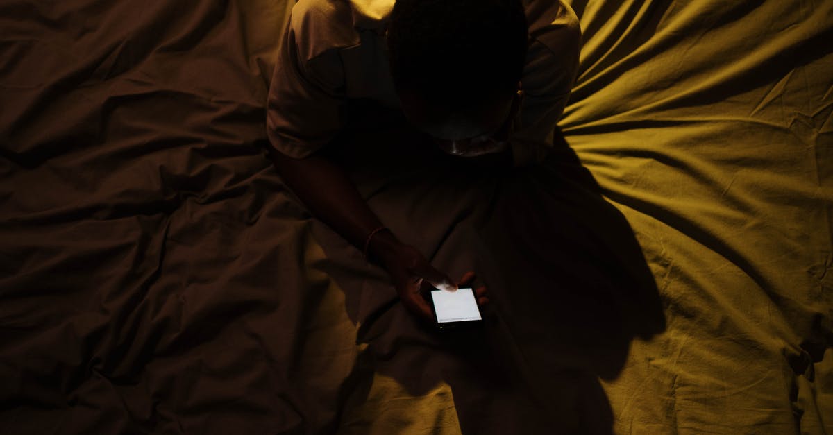 What does the Carbine do in A Dark Room and how do I use it? - A Man Using a Phone While on the Bed What does the Carbine do in A Dark Room and how do I use it? - A Man Using a Phone While on the Bed
