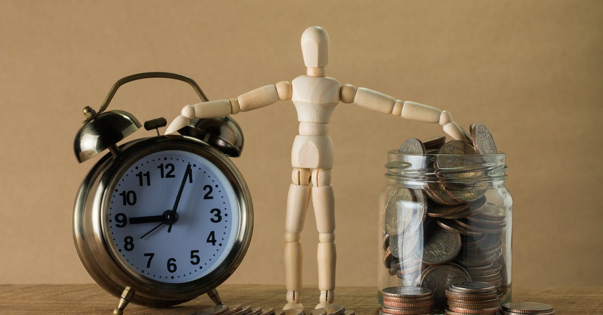What does the Clothier (or any) voodoo doll do? - White and Silver Round Analog Alarm Clock