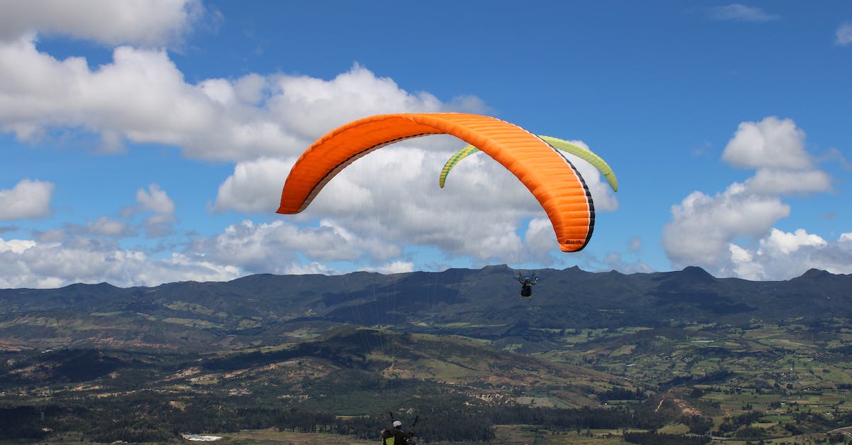 What does the Extreme Hills biome do on a Superflat world? - Person Paragliding with Orange Parachute What does the Extreme Hills biome do on a Superflat world? - Person Paragliding with Orange Parachute