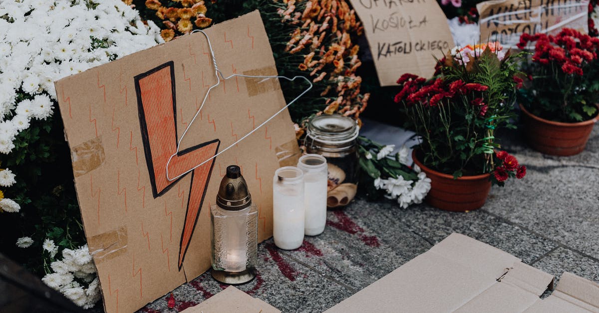 What does the lightning symbol mean? - White Ceramic Jars on White Table