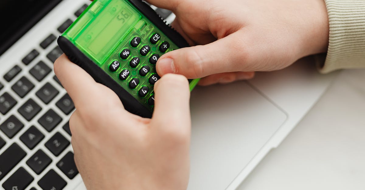 What does the school do? - Person Holding Green and Black Digital Device What does the school do? - Person Holding Green and Black Digital Device