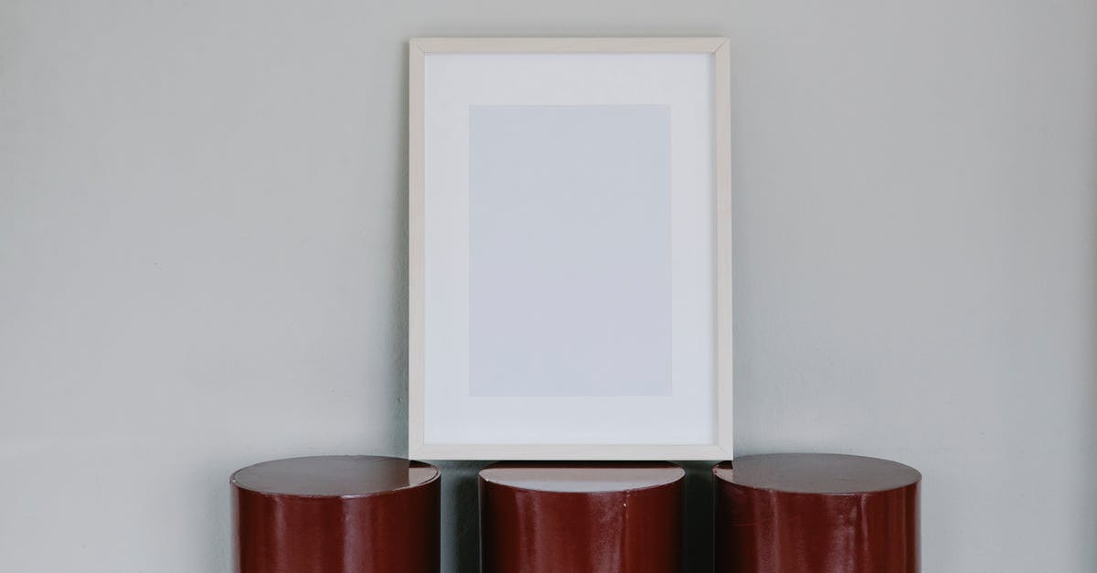 What does the size of the multicoloured circle mean? - Empty photo frame on round blocks in row