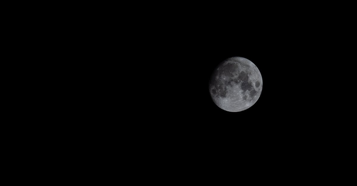 What does the sphere on the dragon mean? - Full Moon in Dark Night Sky