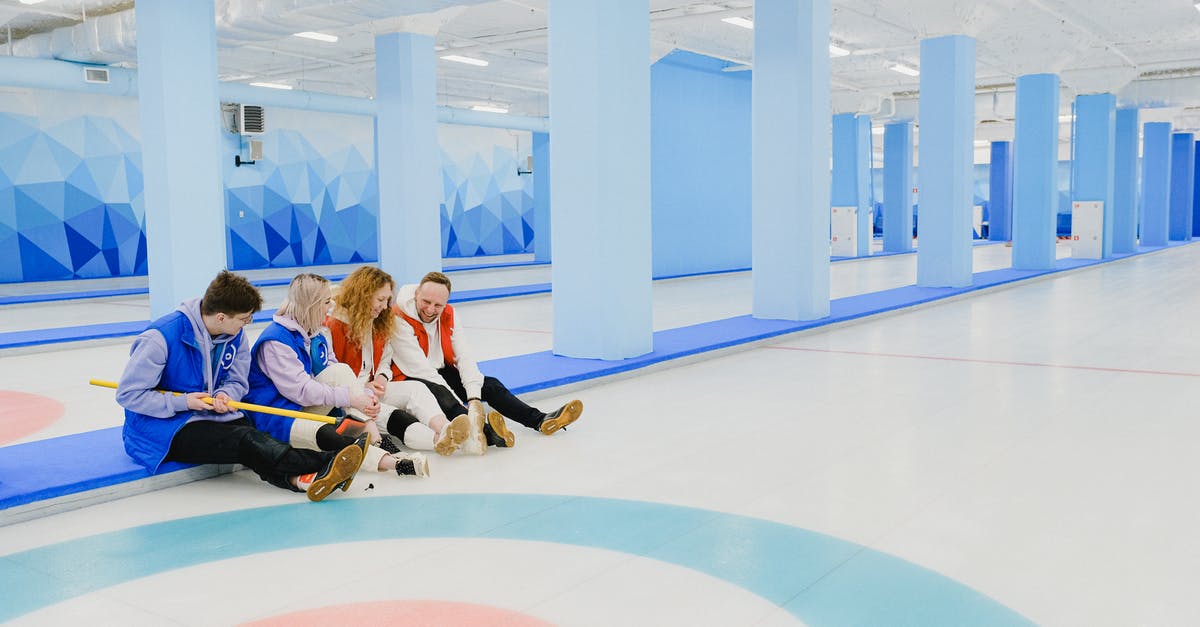 What does this in game dialogue say? - Group of sitting people spending time in curling arena What does this in game dialogue say? - Group of sitting people spending time in curling arena