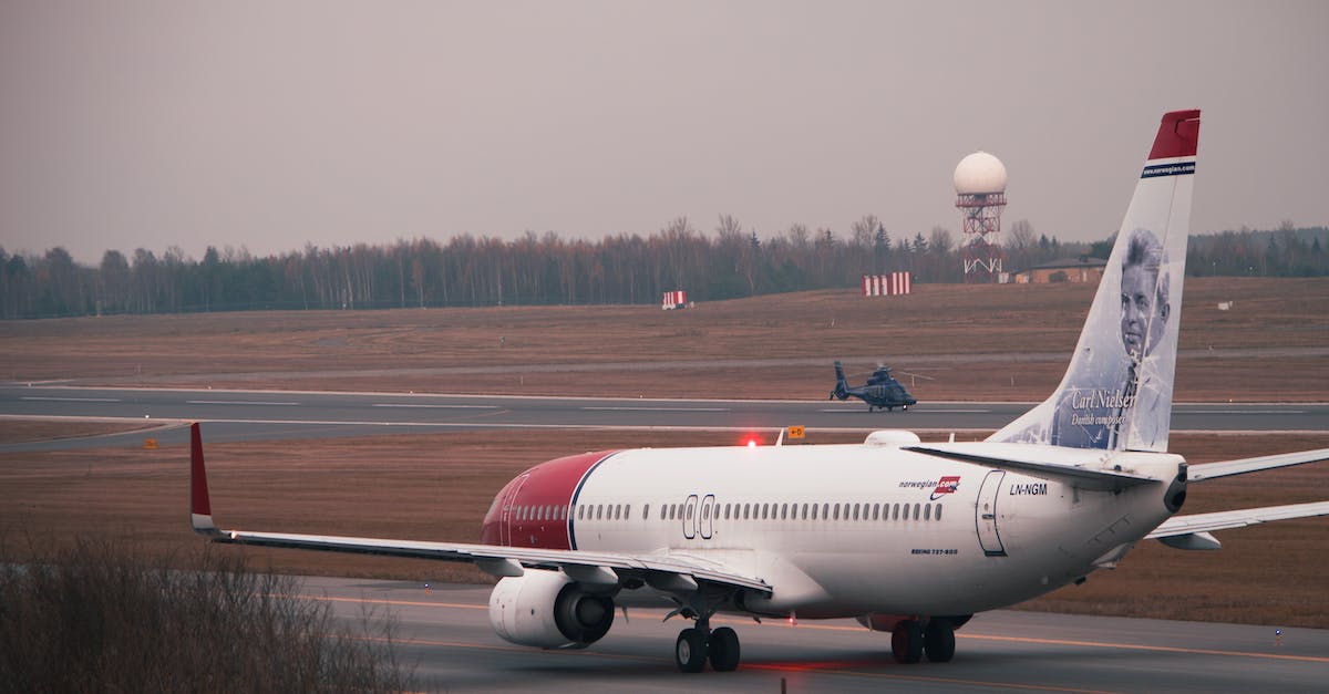 What does upgrading an airport actually do? - White and Red Passenger Plane on Airport
