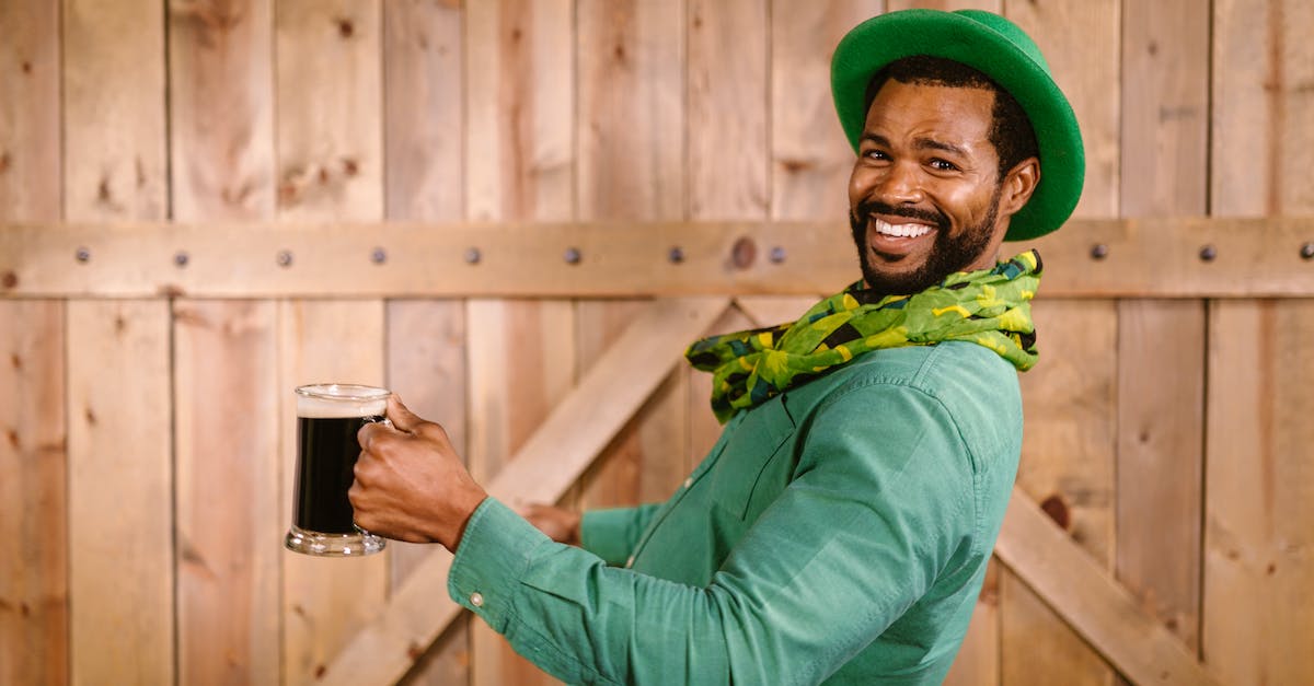 What does Wit do? - Happy Man wearing a Green Hat What does Wit do? - Happy Man wearing a Green Hat