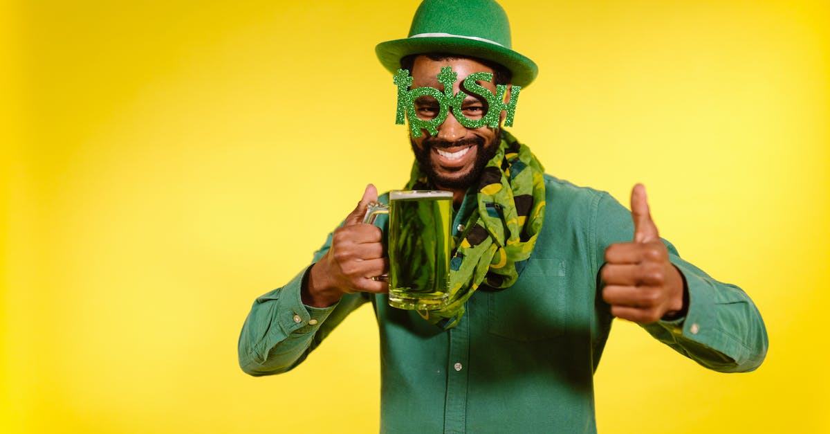 What does Wit do? - Man wearing Green Prop holding a Green Beer What does Wit do? - Man wearing Green Prop holding a Green Beer