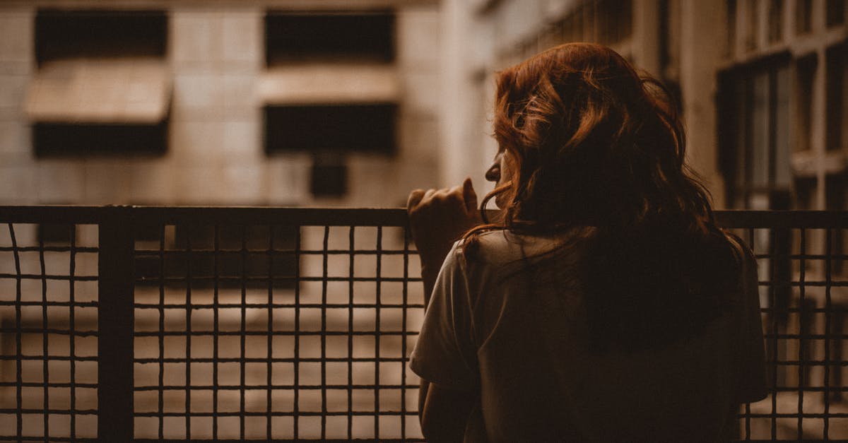 What effect does the left/right hand have on my weapon? - Woman Holding on Railings