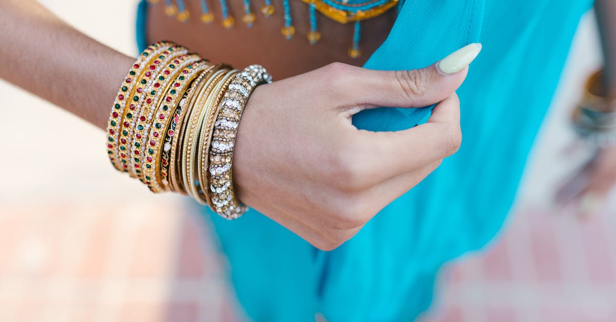 What exactly do the yo-yo accessories do? - Person Wearing Gold and Silver Bracelets What exactly do the yo-yo accessories do? - Person Wearing Gold and Silver Bracelets