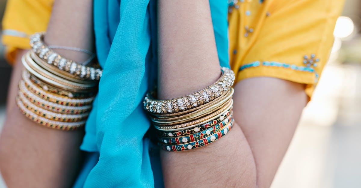 What exactly do the yo-yo accessories do? - Person Wearing Gold and Silver Bracelets What exactly do the yo-yo accessories do? - Person Wearing Gold and Silver Bracelets
