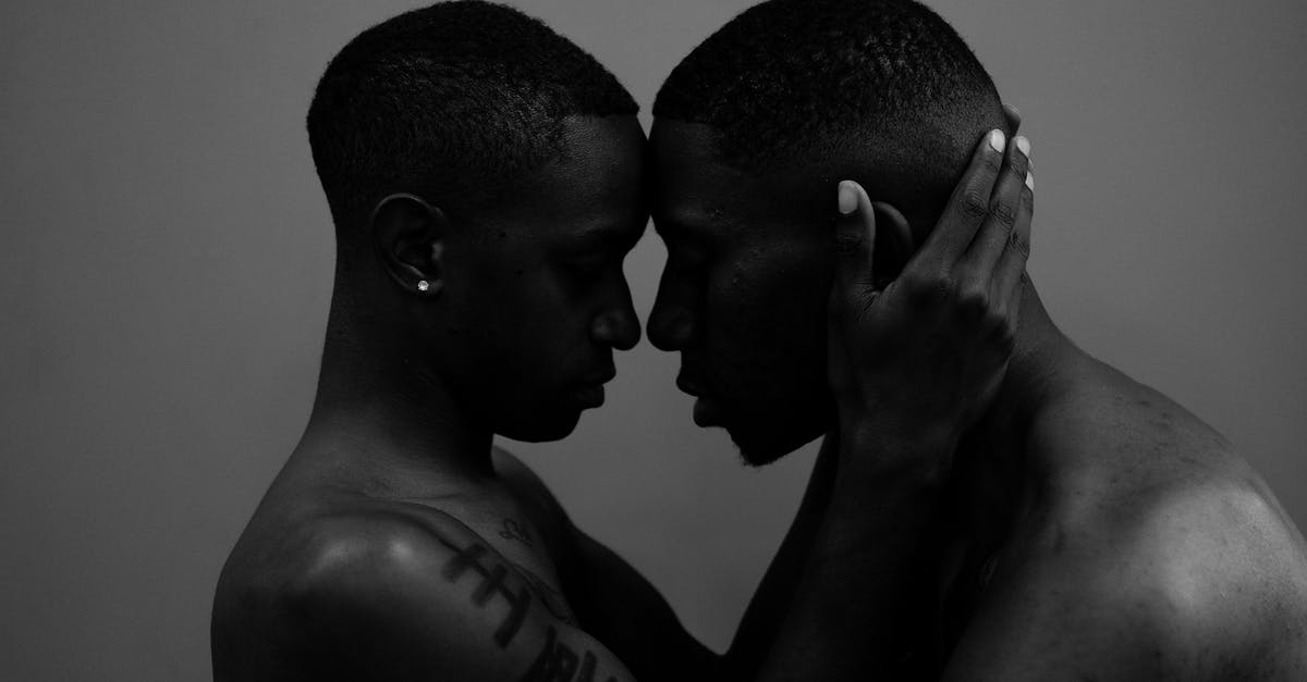 What exactly is affected by a higher view-distance on the server side? - Grayscale Photo of Woman Holding Man Head