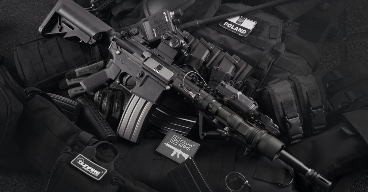 What experimental grenades and ammo types are available? - Grayscale Photo of Black M4a1 on Magazines