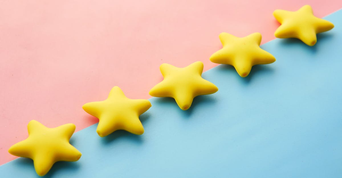 What factors affect the star rating at the end of a level? - Five Yellow Stars on Blue and Pink Background