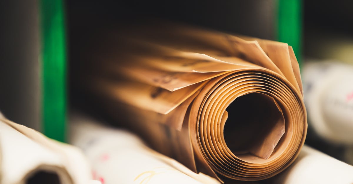 What file allows you to set the default language in Endless Space 2? - Stack of paper rolls in shelf