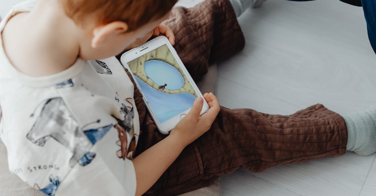 What game is featured in Amazon new phone page? - Person Holding White Tablet Computer