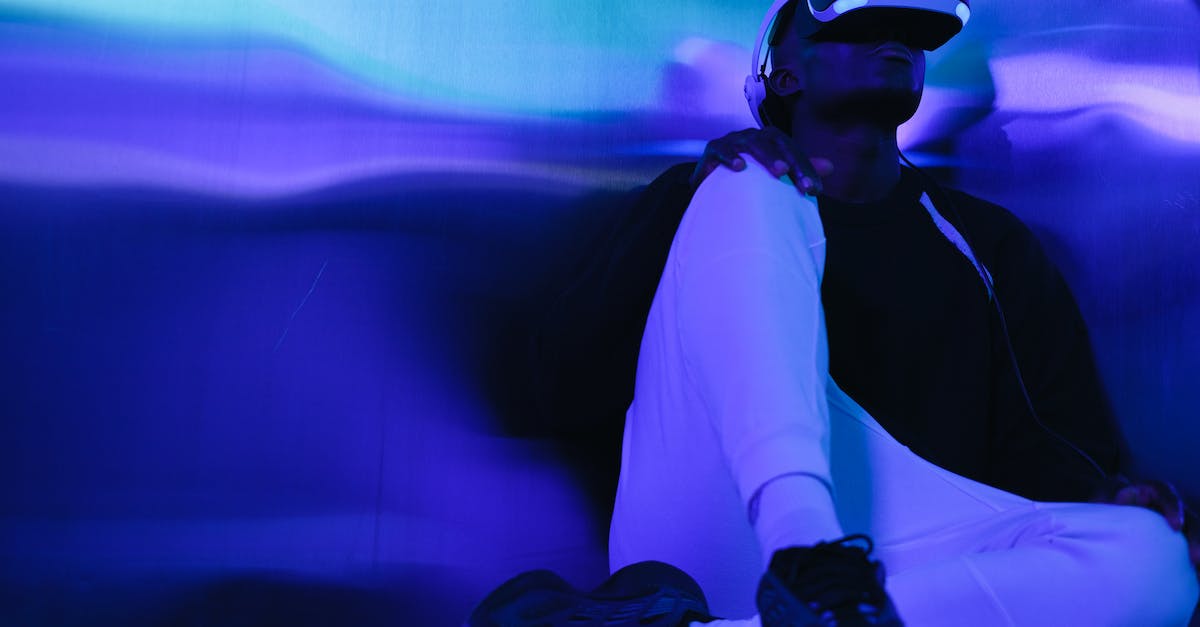 What game is this with a purple room? - Man in Black and White Long Sleeve Shirt Wearing Black Sunglasses What game is this with a purple room? - Man in Black and White Long Sleeve Shirt Wearing Black Sunglasses