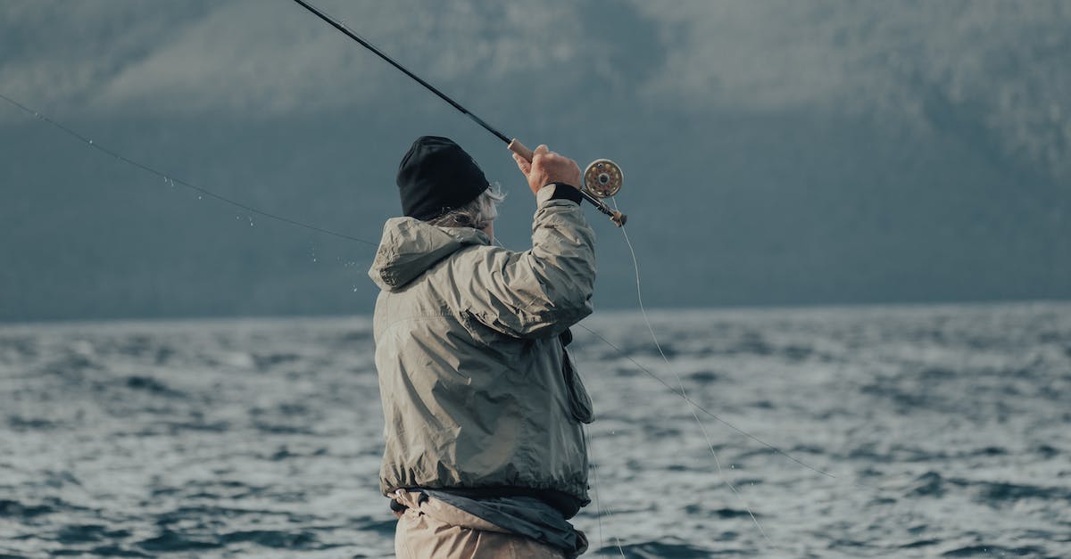 What gear is recommended to absolutely destroy a pumpkin moon? [duplicate] - Man in Brown Jacket Fishing on Sea