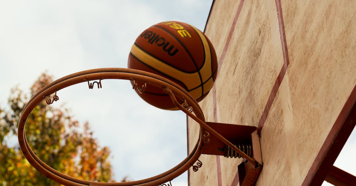 What gives additional scores in the game? - Brown Basketball Above Steel Basketball Hoop What gives additional scores in the game? - Brown Basketball Above Steel Basketball Hoop
