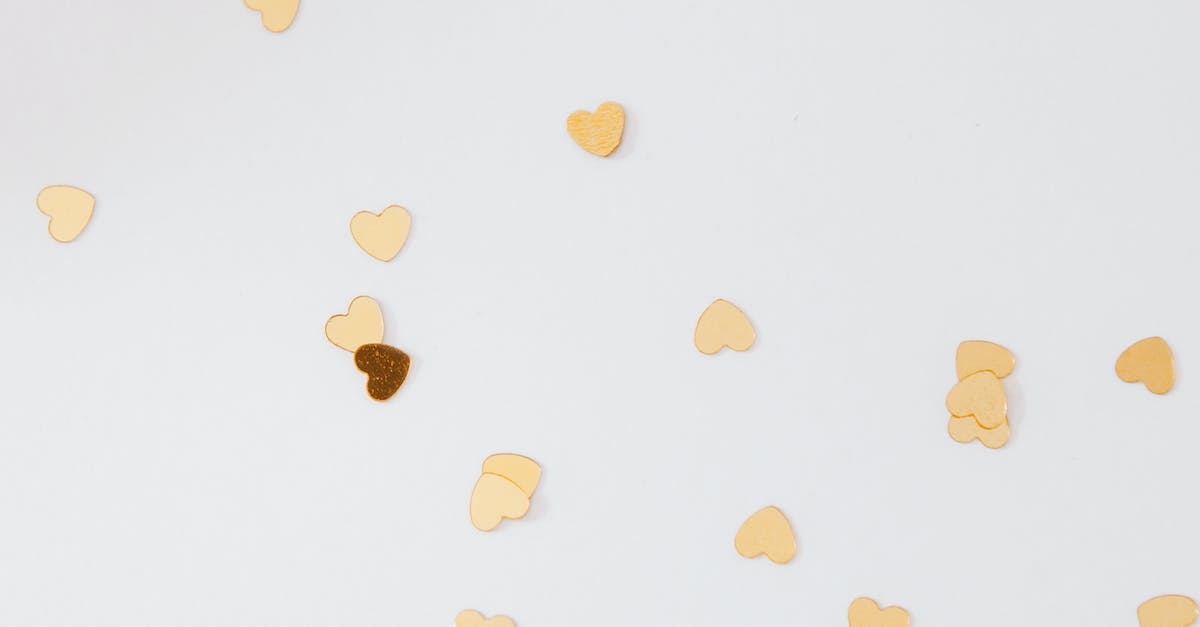 What happened to the gold? - Close-up of Scattered Gold Heart Shaped Confetti  What happened to the gold? - Close-up of Scattered Gold Heart Shaped Confetti