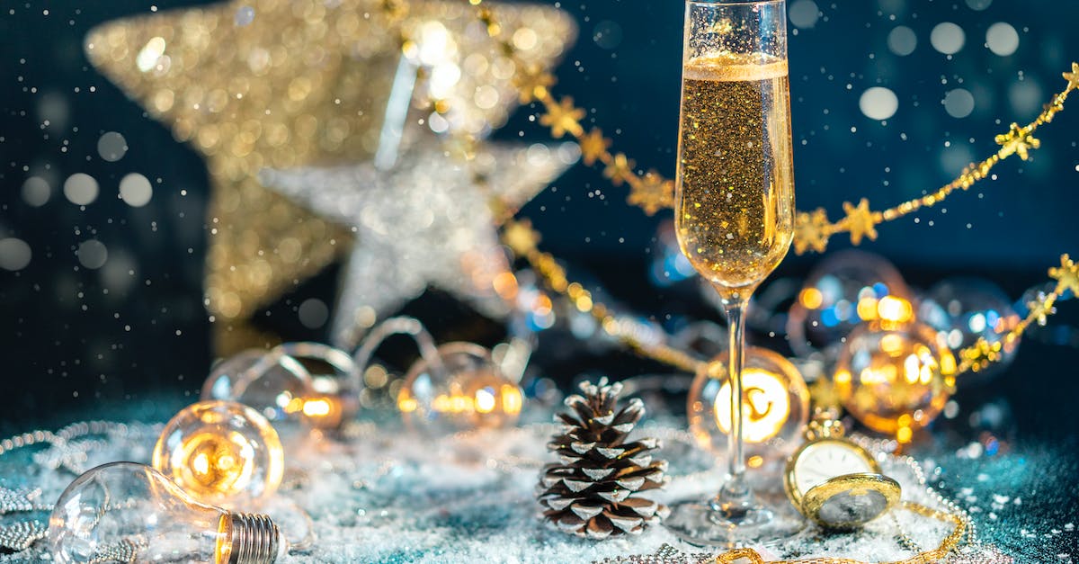 What happened to the gold? - A Glass of Sparkling Wine Near Christmas Ornaments What happened to the gold? - A Glass of Sparkling Wine Near Christmas Ornaments