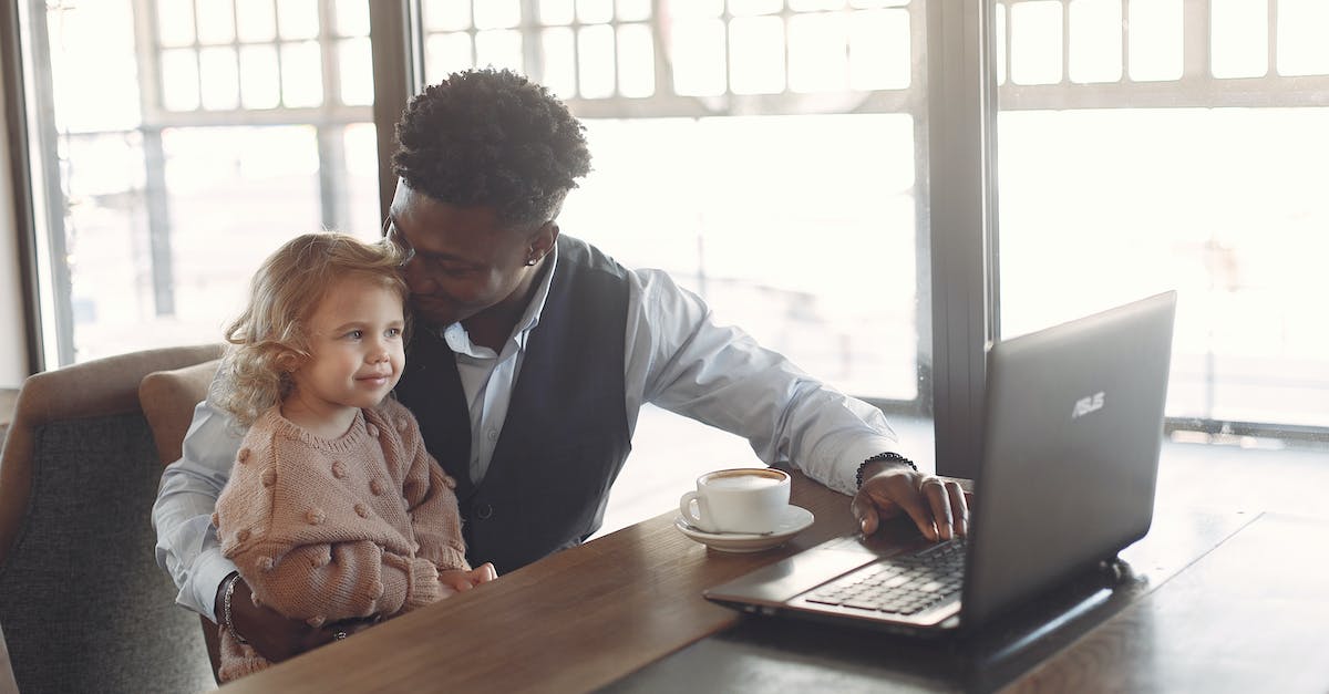 What happened to the shipwrecked guy after Delfino Plaza is flooded? - Cheerful young African American man looking after little girl in cafe using laptop