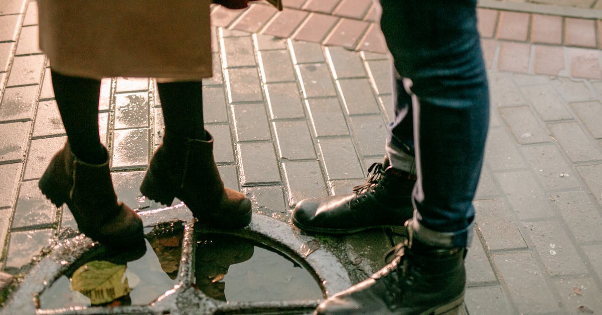 What happens if a defender explodes the hatch the defuser is on? - Person in Black Leather Boots Standing on Brick Floor