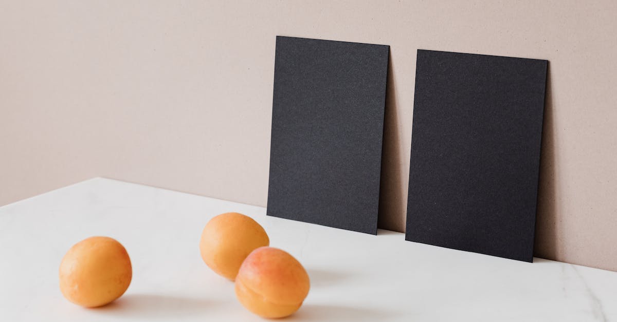 What happens if I use two cards with the same sort of effect? [duplicate] - Creative Arrangement of Two Black Cardboard Cards and Ripe Apricots