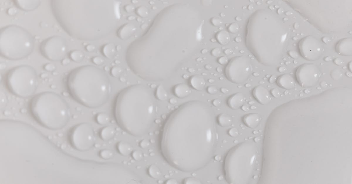 What happens if the killer closes the hatch with generators still needing repair? - Closeup top view of wet plain white background of droplet with translucent clean still water drops of different shapes and sizes What happens if the killer closes the hatch with generators still needing repair? - Closeup top view of wet plain white background of droplet with translucent clean still water drops of different shapes and sizes