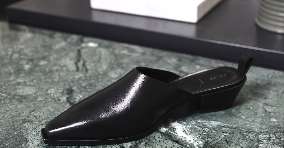 what happens if you can't afford to buy a new ship? - Stylish shiny shoe on marble surface