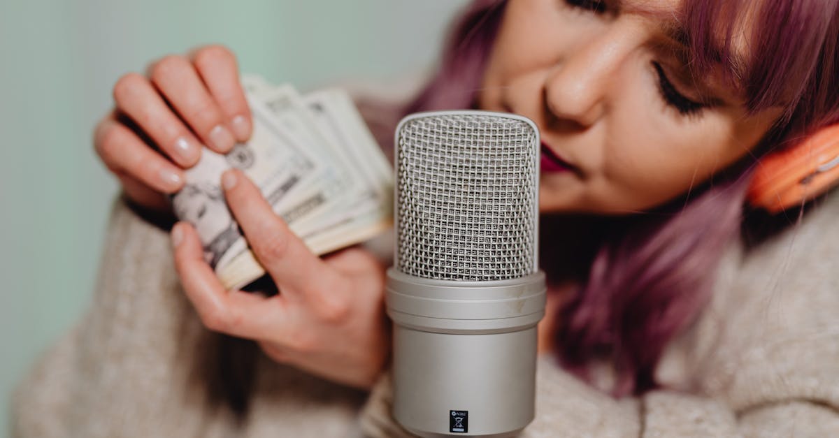 What happens if you don't have enough money to repair? - A Woman in Gray Sweater Holding Bank Notes