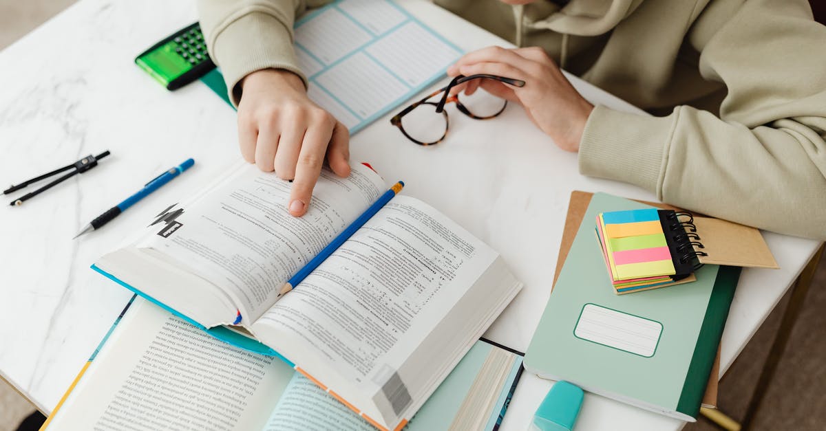 What happens if you use the 'you are special' book when all of your stats are at 10? - Young Man Reading A Book and Studying 