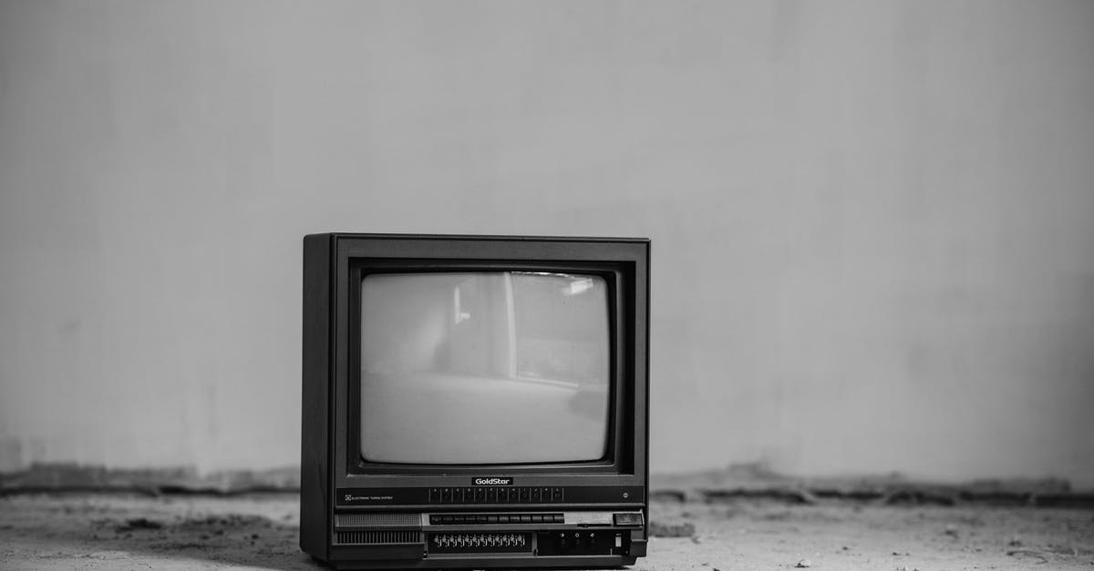 What happens if you use Zarya's barrier on a Reinhardt with his barrier activated? - Vintage TV set on floor near wall