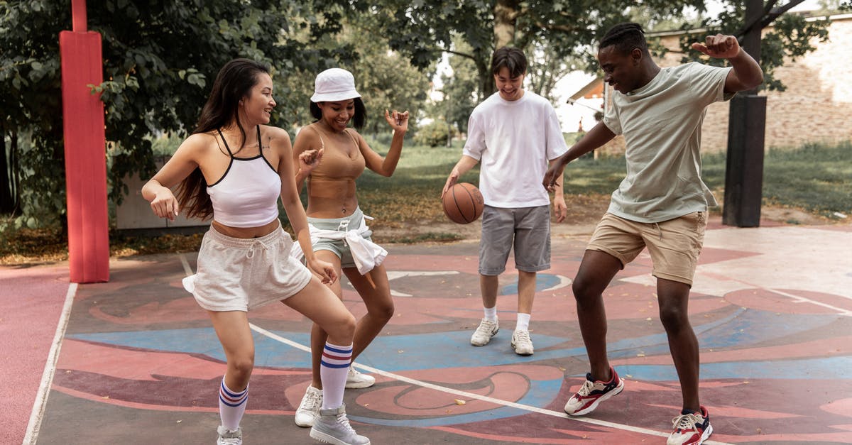What happens in the 3rd victory lap if I don't have The Lost? - Delighted young diverse people dancing on sports ground What happens in the 3rd victory lap if I don't have The Lost? - Delighted young diverse people dancing on sports ground