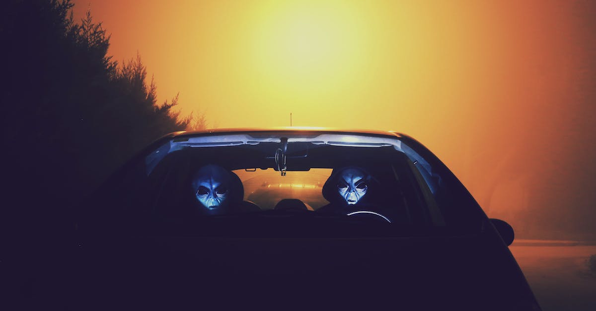 What happens to aliens and items outside of captured UFOs? - Two Alien Inside Car Wallpaper