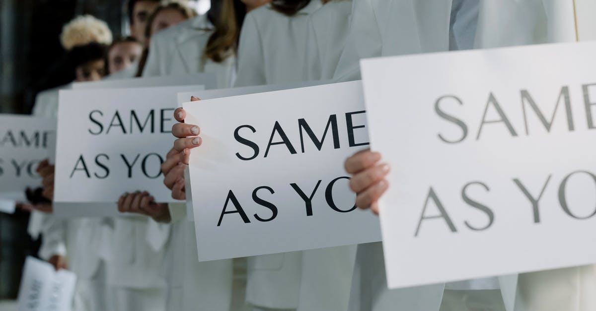 What happens to candies when you transfer ALL pokemon of the same evolution line? [duplicate] - People in White Outfits Holding Placards