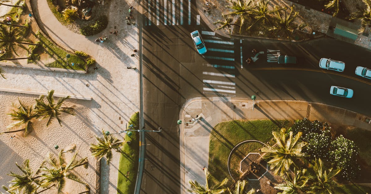 What happens to my turns when I ascend? - Aerial Shot of an Asphalt Road with Turns What happens to my turns when I ascend? - Aerial Shot of an Asphalt Road with Turns