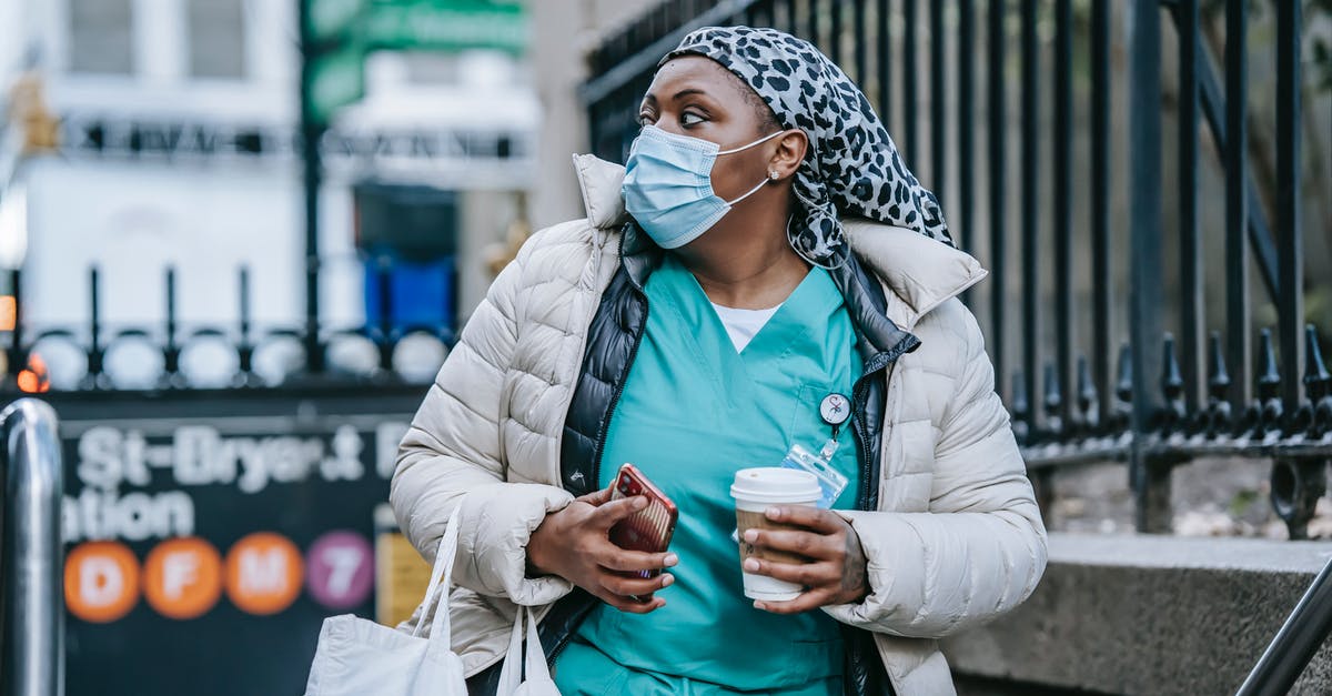 What happens to Pokémon you leave in Pokémon Go Gyms? - Adult black nurse with takeaway coffee leaving metro station What happens to Pokémon you leave in Pokémon Go Gyms? - Adult black nurse with takeaway coffee leaving metro station