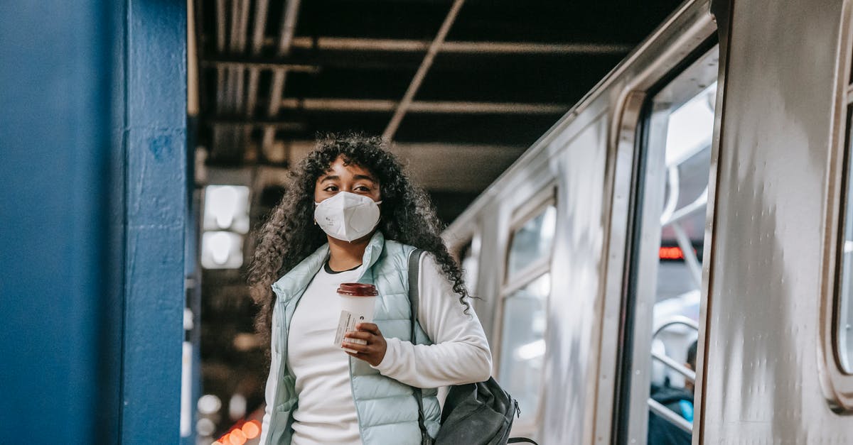 What happens to Pokémon you leave in Pokémon Go Gyms? - Black woman in mask leaving metro train What happens to Pokémon you leave in Pokémon Go Gyms? - Black woman in mask leaving metro train