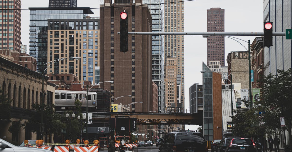 What happens when one reaches the center of the universe? - Cars on Road Near High Rise Buildings What happens when one reaches the center of the universe? - Cars on Road Near High Rise Buildings
