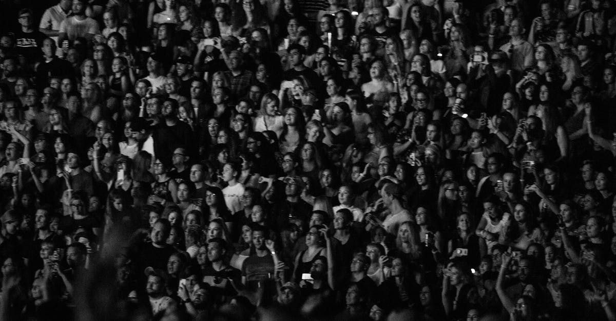 What happens when you're really plagued by a popular song but you have no weasels to pop? - Group of people in concert hall What happens when you're really plagued by a popular song but you have no weasels to pop? - Group of people in concert hall