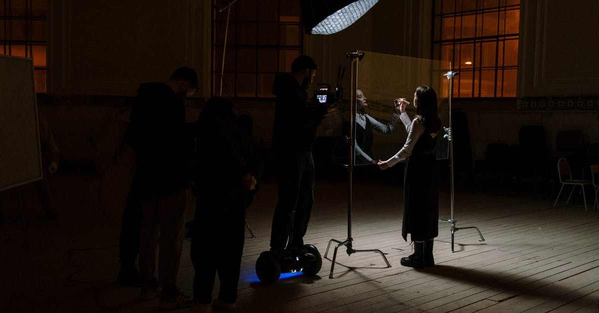 What happens when your crew is full and you're awarded a new crew member? - Man in Black Suit Standing on Stage