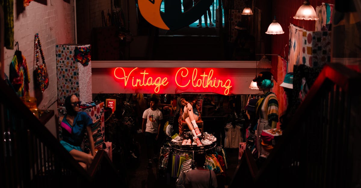 What happens with Steam trading cards from sale after the sale? - Neon sign in shop with vintage clothes