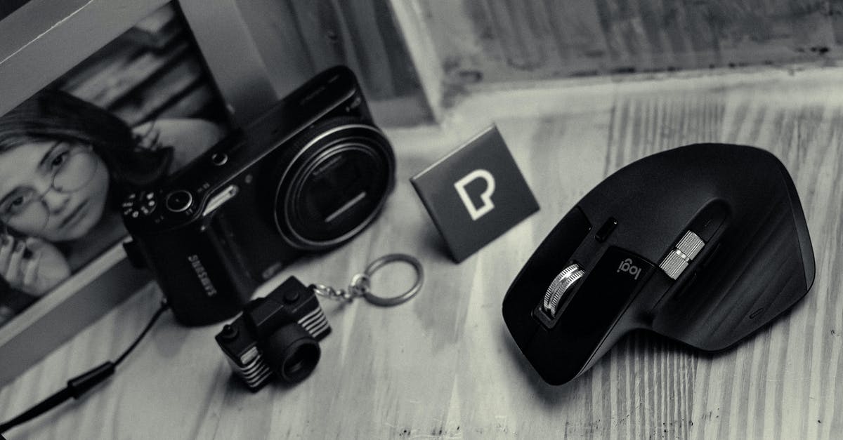 What happens with the Items in Corvo Bianco when starting a New Game+ - Modern photo camera near black game mouse
