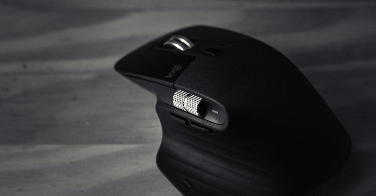 What happens with the Items in Corvo Bianco when starting a New Game+ - Black and white of contemporary convenient game mouse with various buttons on table
