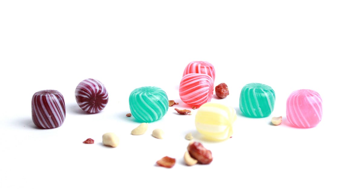 What influences the number of candies needed to evolve a Pokémon? - Pink and Yellow Round Candies