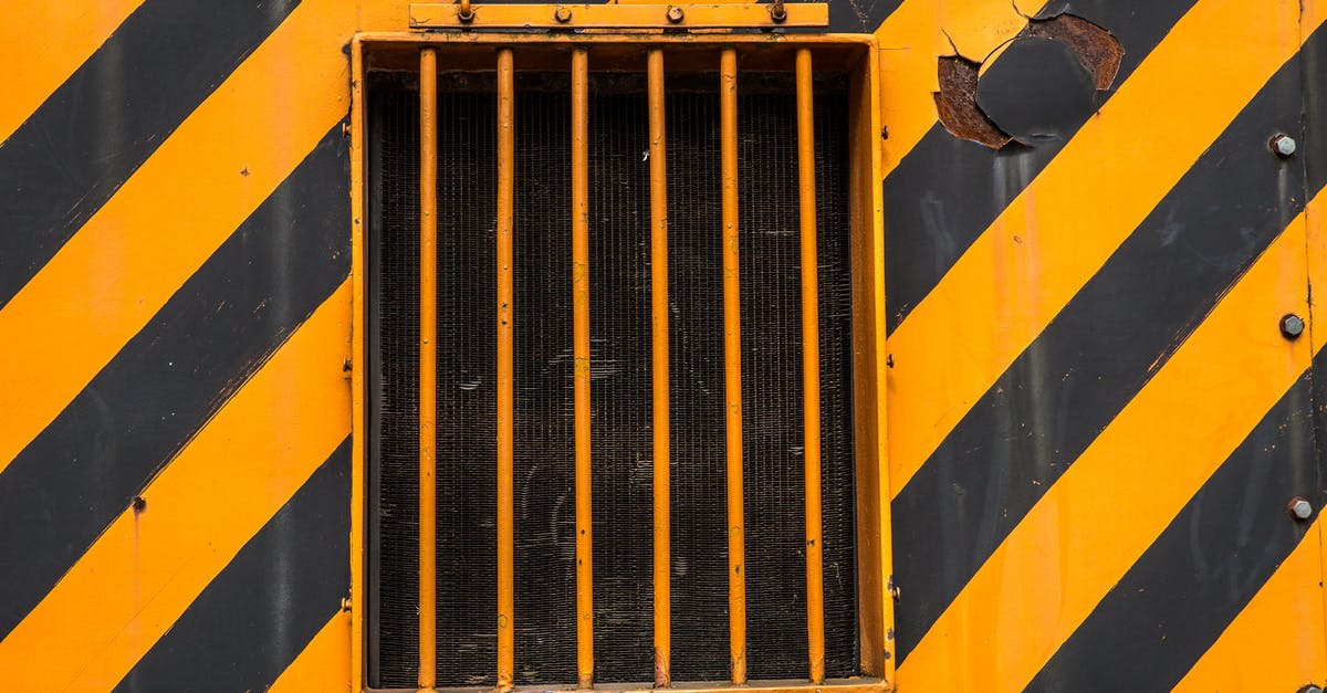 What is a heavy weapon? - An Orange Metallic Window in a Black and Orange Metal Wall