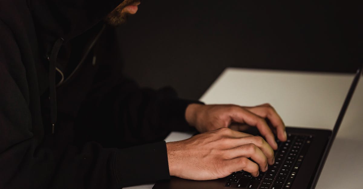 What is a remote hacking device takedown point? - Crop focused programmer hacking database on laptop What is a remote hacking device takedown point? - Crop focused programmer hacking database on laptop